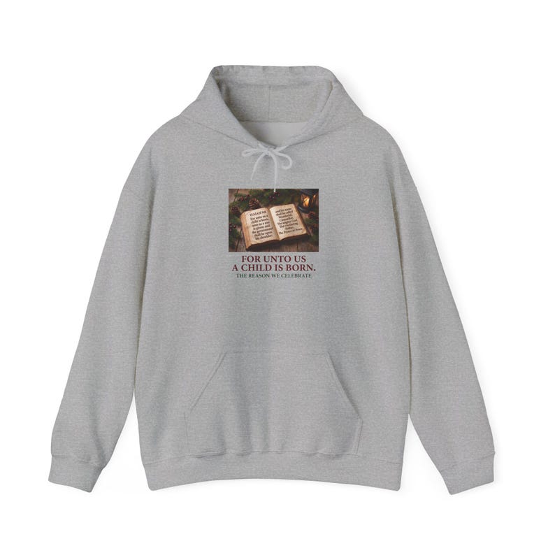 Sport Grey hoodie with an open Bible scene above the words For Unto Us a Child Is Born.
