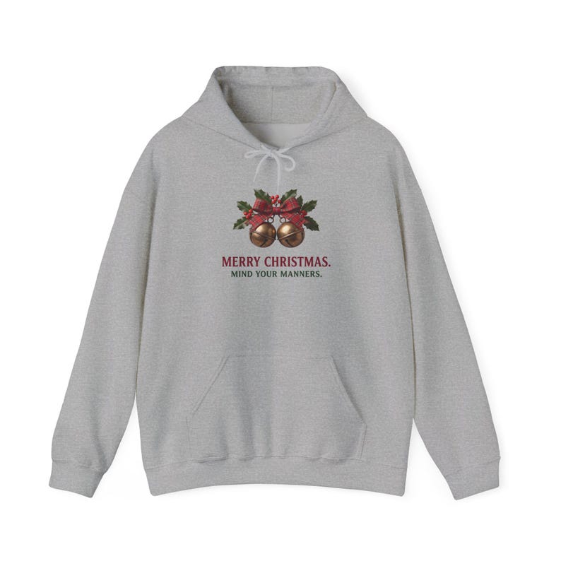 Sport Grey hoodie with gold bells, red ribbon and holly above the words Merry Christmas. Mind Your Manners.